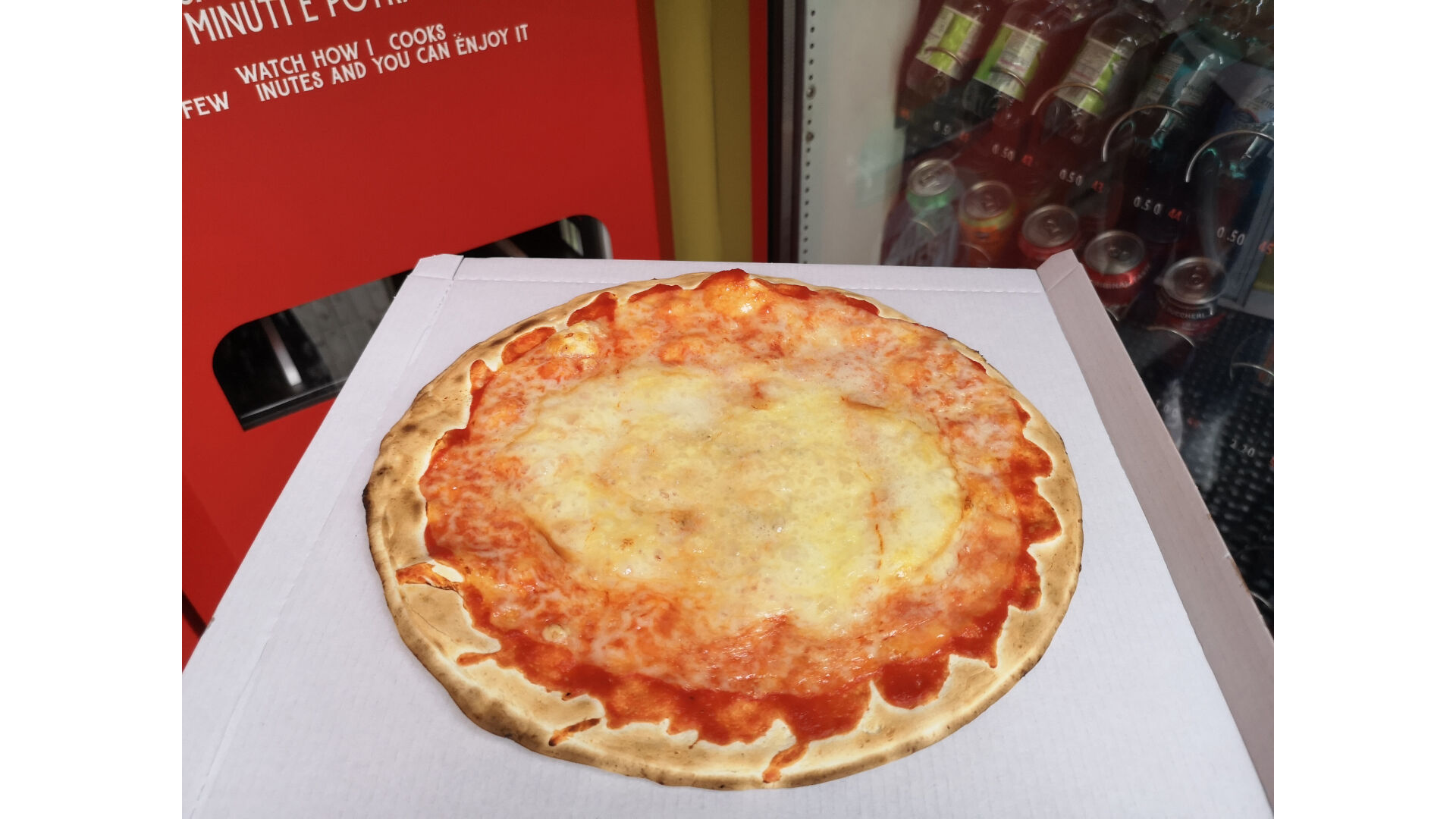 <p>Rome's newest pizzaiolo (pizza-maker), "Mr. Go," is a vending machine pumping out four types of pizza for whenever you feel like one.</p>